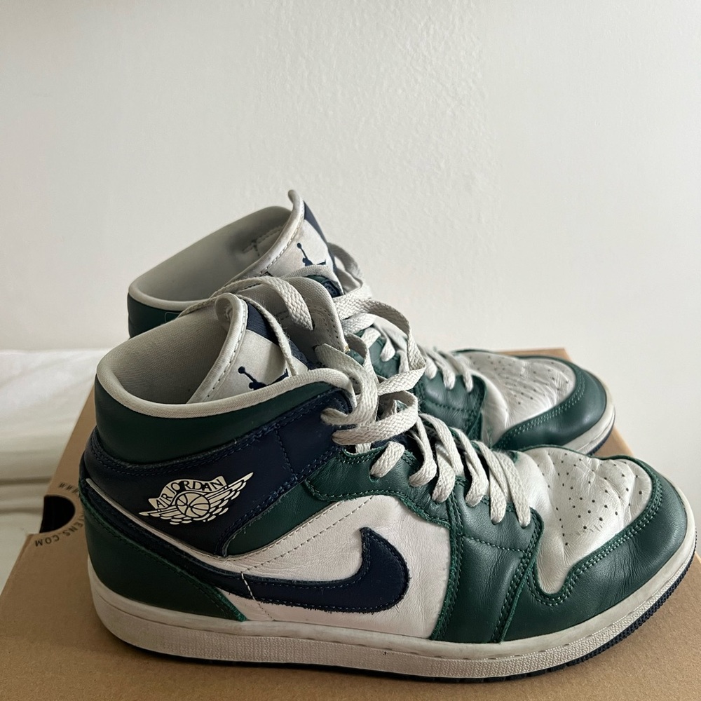 Navy and green Air Jordans